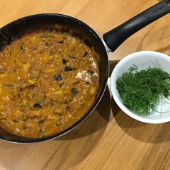 A picture of Indian Eggplant and Potato Curry.