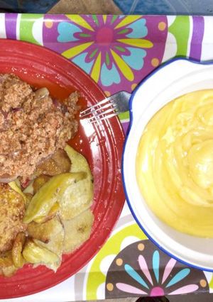 A picture of Fried sweet potatoes with fried eggs and yellow pap.