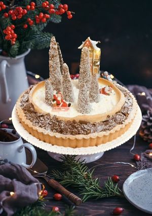 Foto di Crostata di Natale con Panna Cotta, Crema di Mele e Cioccolato