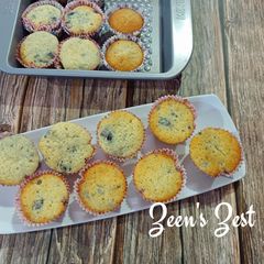 A picture of Mulberry and White Butter Cupcakes.