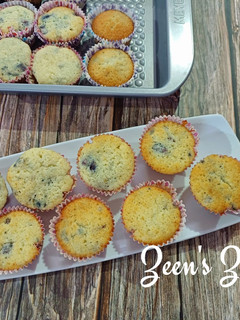 A picture of Mulberry and White Butter Cupcakes.