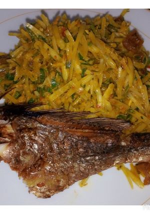A picture of Abacha and grilled croaker.