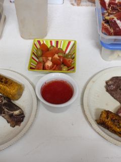 Una foto de Chuletón con maíz cocido