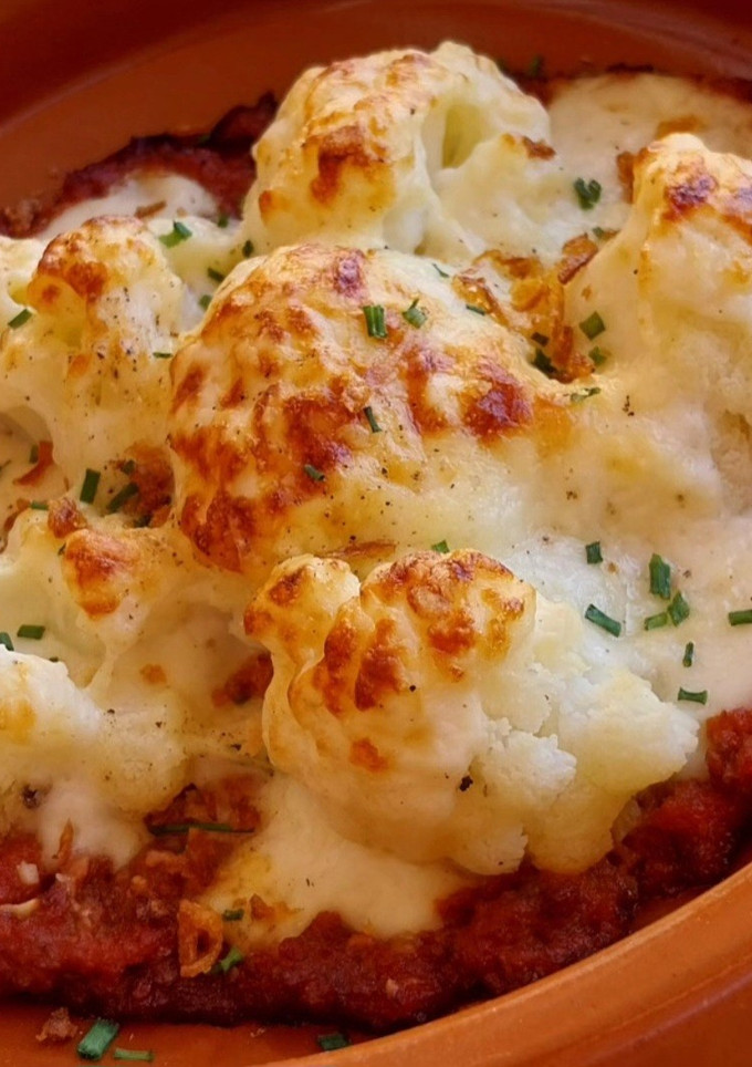 Una foto de Coliflor gratinada con boloñesa