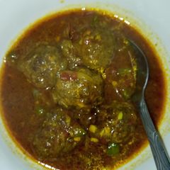 A picture of Saucy meat balls.
