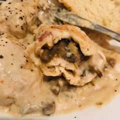A picture of Creamy Mushroom-stuffed Chicken.