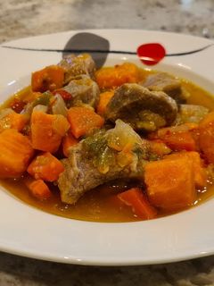 Una foto de Secreto ibérico estofado con boniatos
