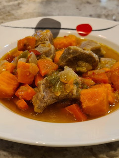 Una foto de Secreto ibérico estofado con boniatos
