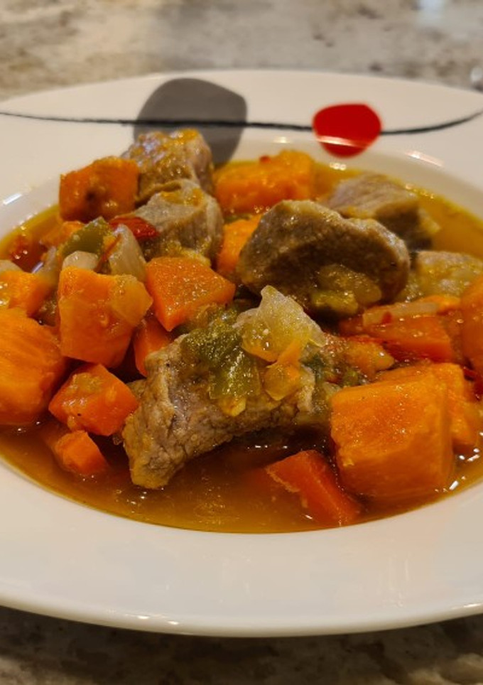 Una foto de Secreto ibérico estofado con boniatos