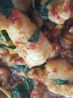 A picture of Stir-Fried Chicken Thighs with Bamboo Shoots and Basil.