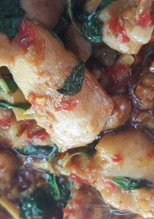A picture of Stir-Fried Chicken Thighs with Bamboo Shoots and Basil.
