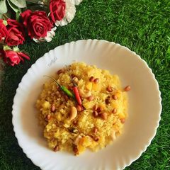 A picture of Aloo Poha (Potato with Flattened Rice Pulao).