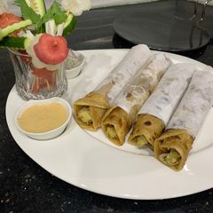 Tawa chicken chutney roll A picture of Tawa chicken chutney roll.