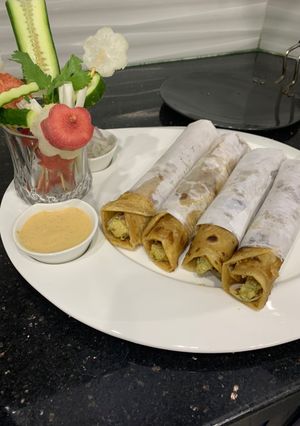 A picture of Tawa chicken chutney roll.