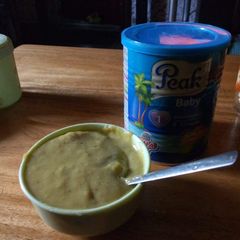 A picture of Banana and corn puree.
