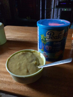 A picture of Banana and corn puree.