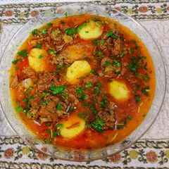 A picture of Aloo Gosht.
