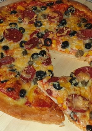 صورة لوصفة بيتزا بسجق 😋😋😋