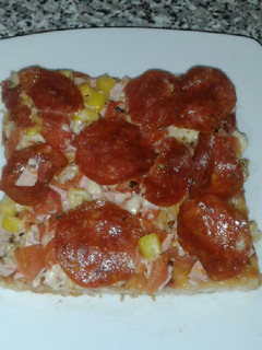 Una foto de Exquisita pizza de pepperoni