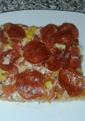Una foto de Exquisita pizza de pepperoni