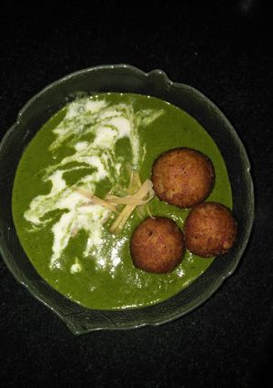 A picture of Palak paneer kofta.