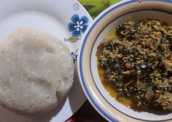 Egusi soup with scent leaf and uzuza seed