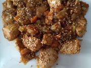 Una foto de arroz salsa ostras