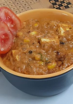 A picture of Corn paneer masala Curry.
