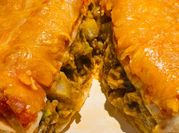 A picture of cheesy potato burritos