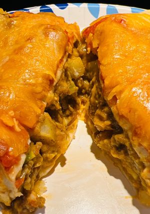 A picture of Baked Beef and Potato Burritos.