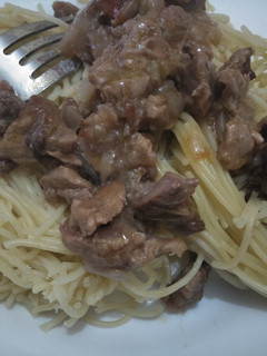 A picture of Spaghetti with Mutton stew.