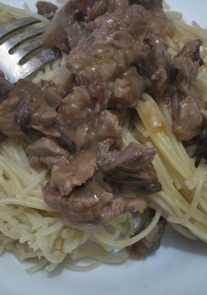 A picture of Spaghetti with Mutton stew.