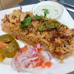 A picture of Chana Daal aur Boneless Chicken Pulao.