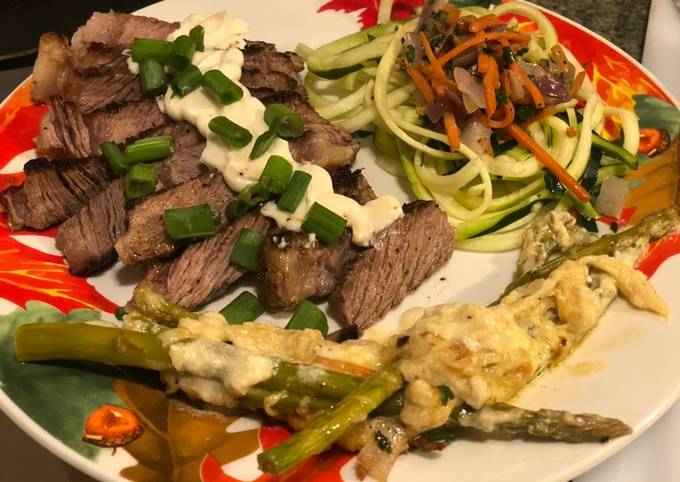 Seared Ribeye, Cheesy Baked Asparagus, with Zoodle Medley