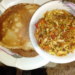 A picture of Pancake with vegetables.