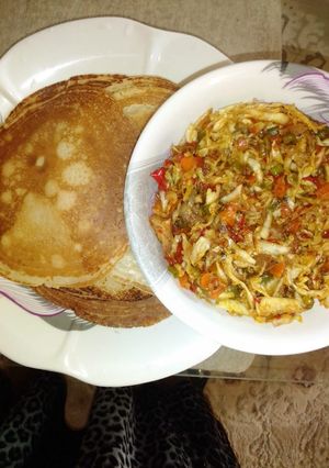 A picture of Pancake with vegetables.