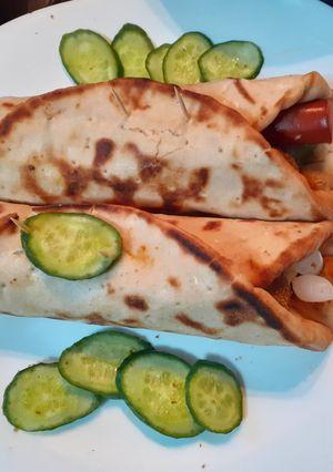 A picture of Chicken Ball n sausage Pita roll.