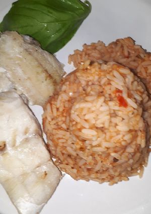 Una foto de Timbal de arroz con pescado 🐠 al grill