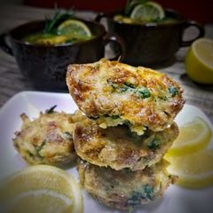 A picture of Classic potatoes puffs with soup as sides.