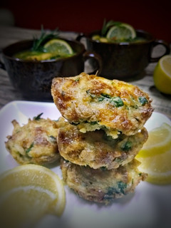 A picture of Classic potatoes puffs with soup as sides.