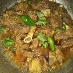 A picture of Green chillies mutton.