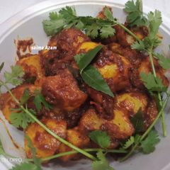 A picture of Khattay aloo (potato).