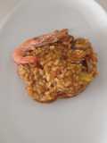 Arroz meloso de berberechos y langostinos