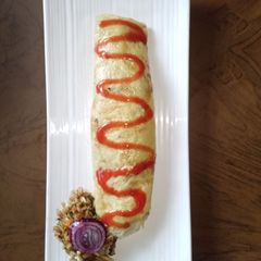 A picture of Omurice (Korean omelette rice).