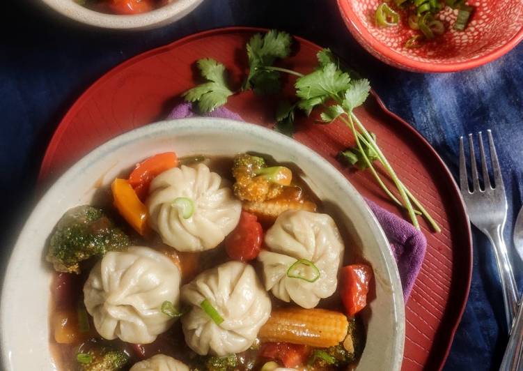 Chicken momos with spicy honey vegetables