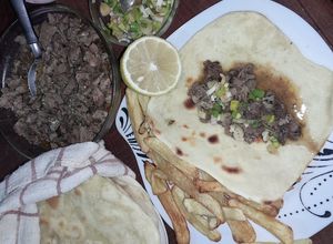 Una foto de Tacos de Capón