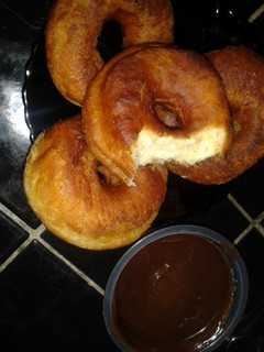 A picture of Soft Doughnuts - Glazed with Chocolate Fudge Or Cinnamon Sugared.