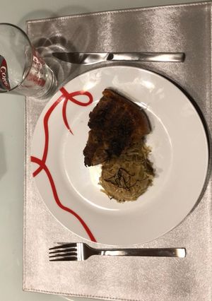 Savanyú káposzta ágyon sült bőrös malac recept fotója