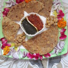 A picture of Achari Masala paneer stuffed chole paratha.