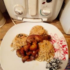 A picture of Jollof spaghetti with ugwu.